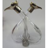 A pair of conjoined blown glass oil/vinegar bottles with silver mounts Birmingham 1924 11