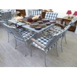 A Leisuregrow grey painted enamelled steel patio dining table with a central umbrella aperture,