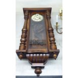 A late Victorian mahogany and walnut cased regulator;