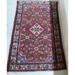 A Persian rug,