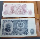 A stitched pigskin wallet and banknotes: to include seven Queen Elizabeth II ten shilling notes;