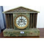 A late Victorian green marble cased mantle clock of architectural form with gilt metal mounts;