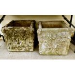 A pair of composition stone garden planters,
