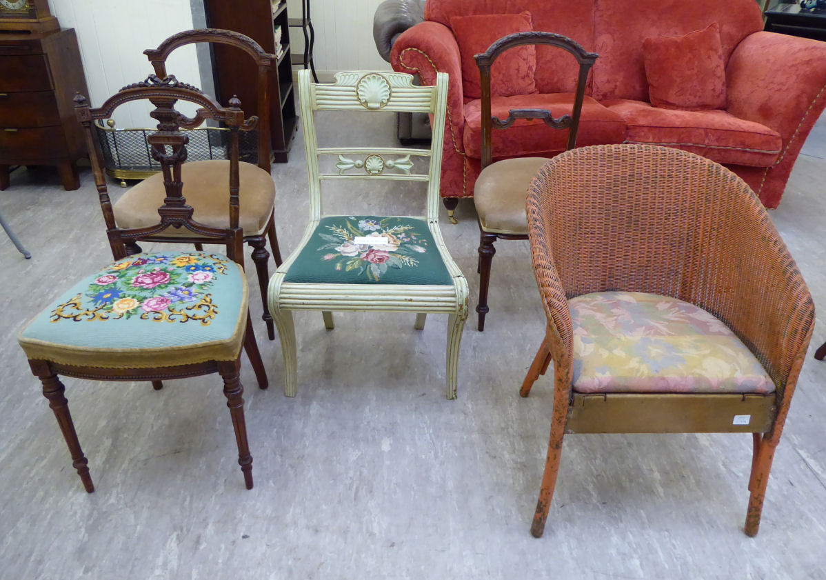 Five chairs: to include a pair of late 19thC French walnut framed salon chairs,