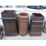 Two similar stoneware chimney pots of square,