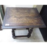 An early 20thC Jacobean design oak occasional table, the top with a moulded edge,