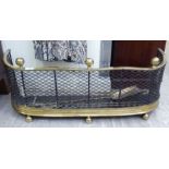 A late 19thC brass and iron mesh demi-lune fender 10''h 30''w 12''deep;