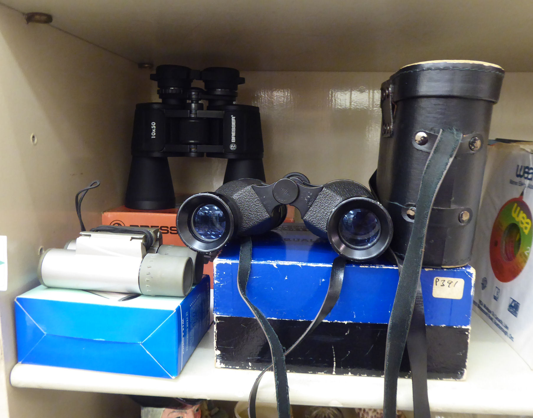 Three pairs of binoculars, viz.