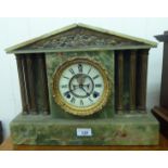 A late Victorian green marble cased mantle clock of architectural form with gilt metal mounts;