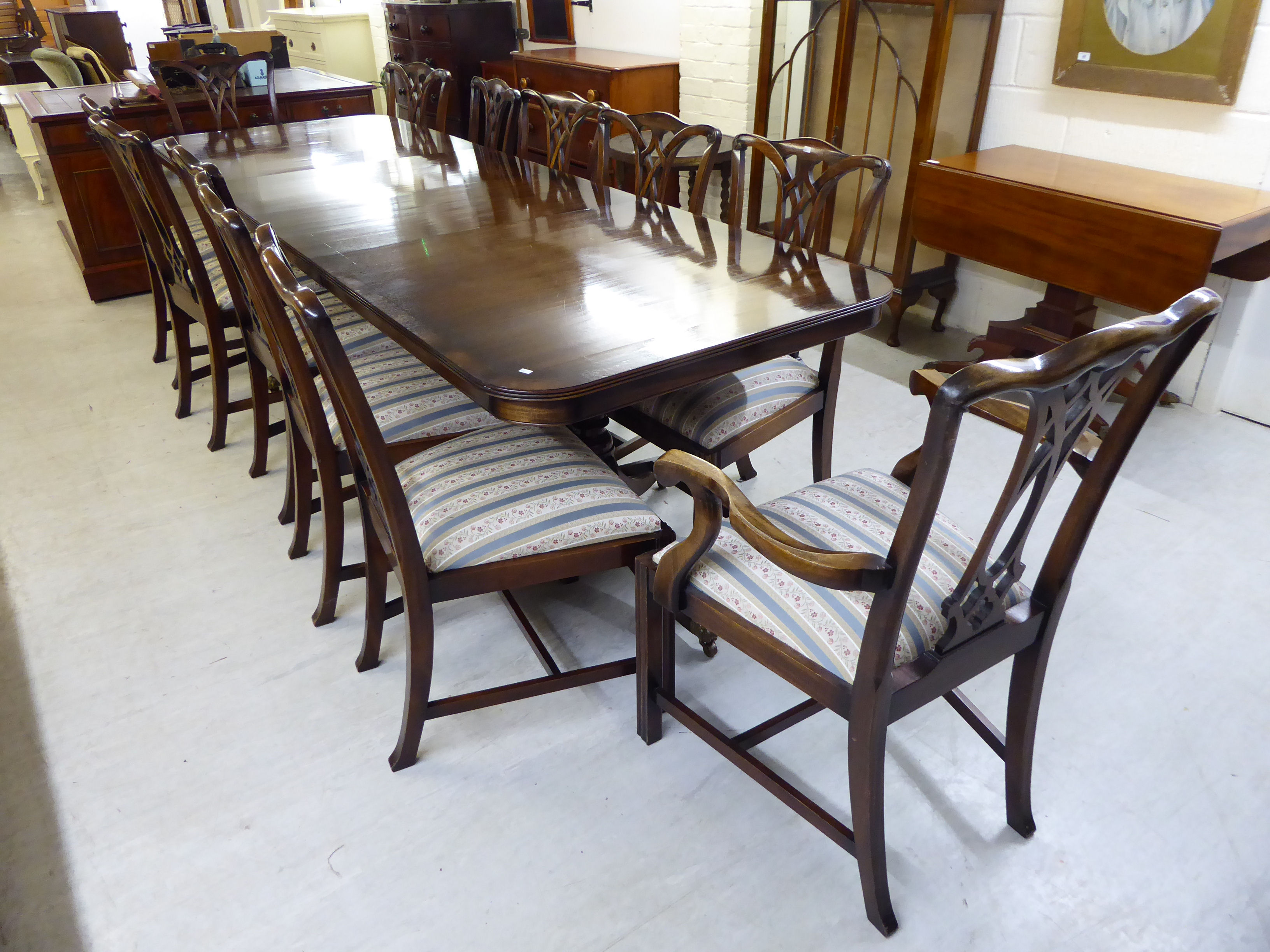 A Rackstraw Regency style string inlaid crossbanded mahogany twin pedestal dining table, - Image 2 of 3