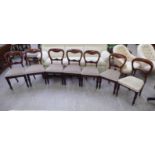 A matched set of seven late Victorian mahogany framed balloon and bar back dining chairs,