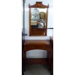 A modern yew wood single drawer, two tier side table 30''h 26''w; and a matching mirror,