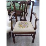 A George III mahogany framed Chippendale design splat back elbow chair,