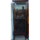 A modern Edwardian style mahogany finished display cabinet with a single door,