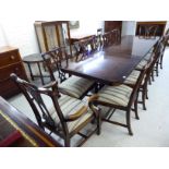 A Rackstraw Regency style string inlaid crossbanded mahogany twin pedestal dining table,