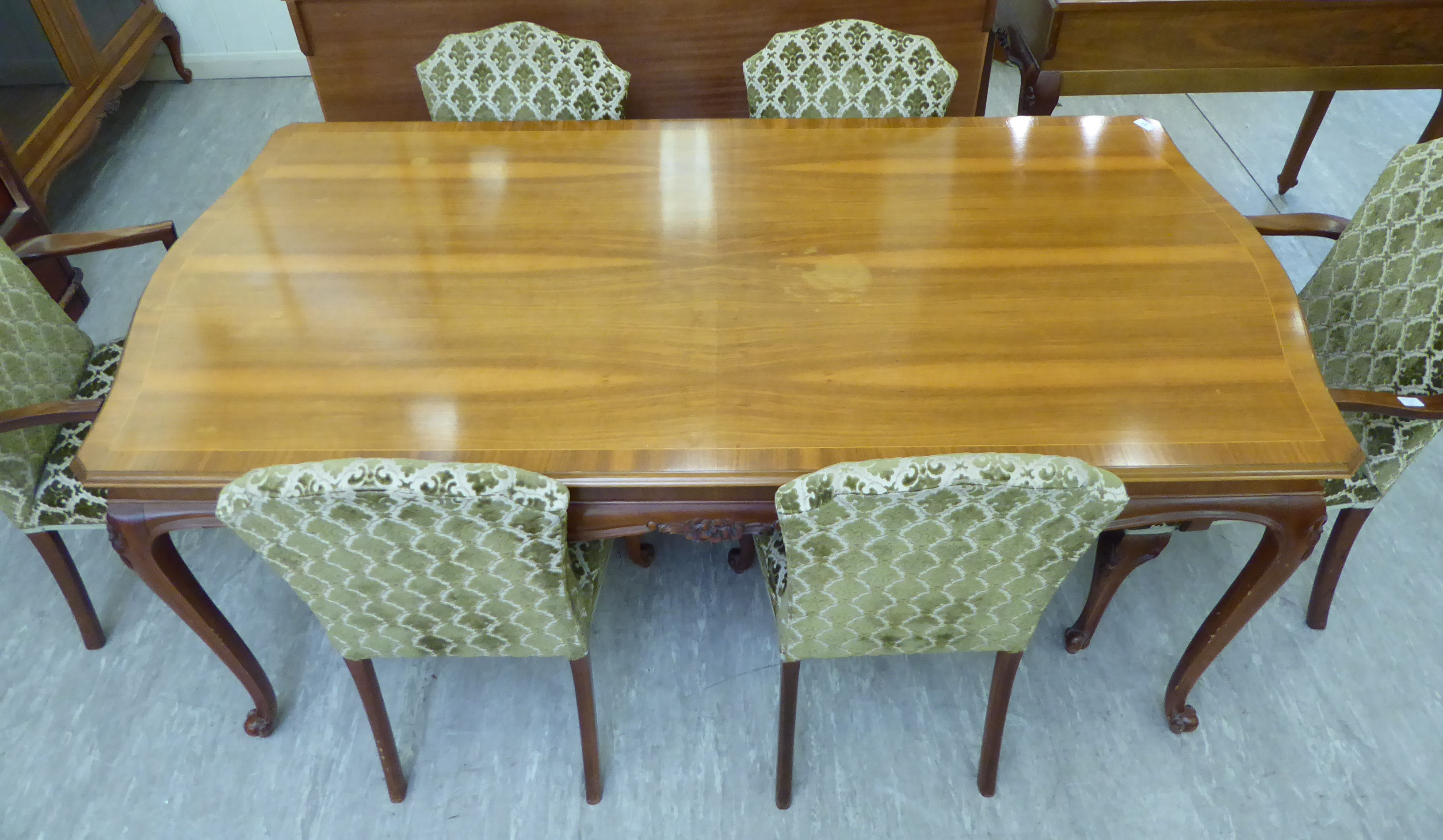 A mid 20thC walnut veneered dining suite, viz. - Image 5 of 5