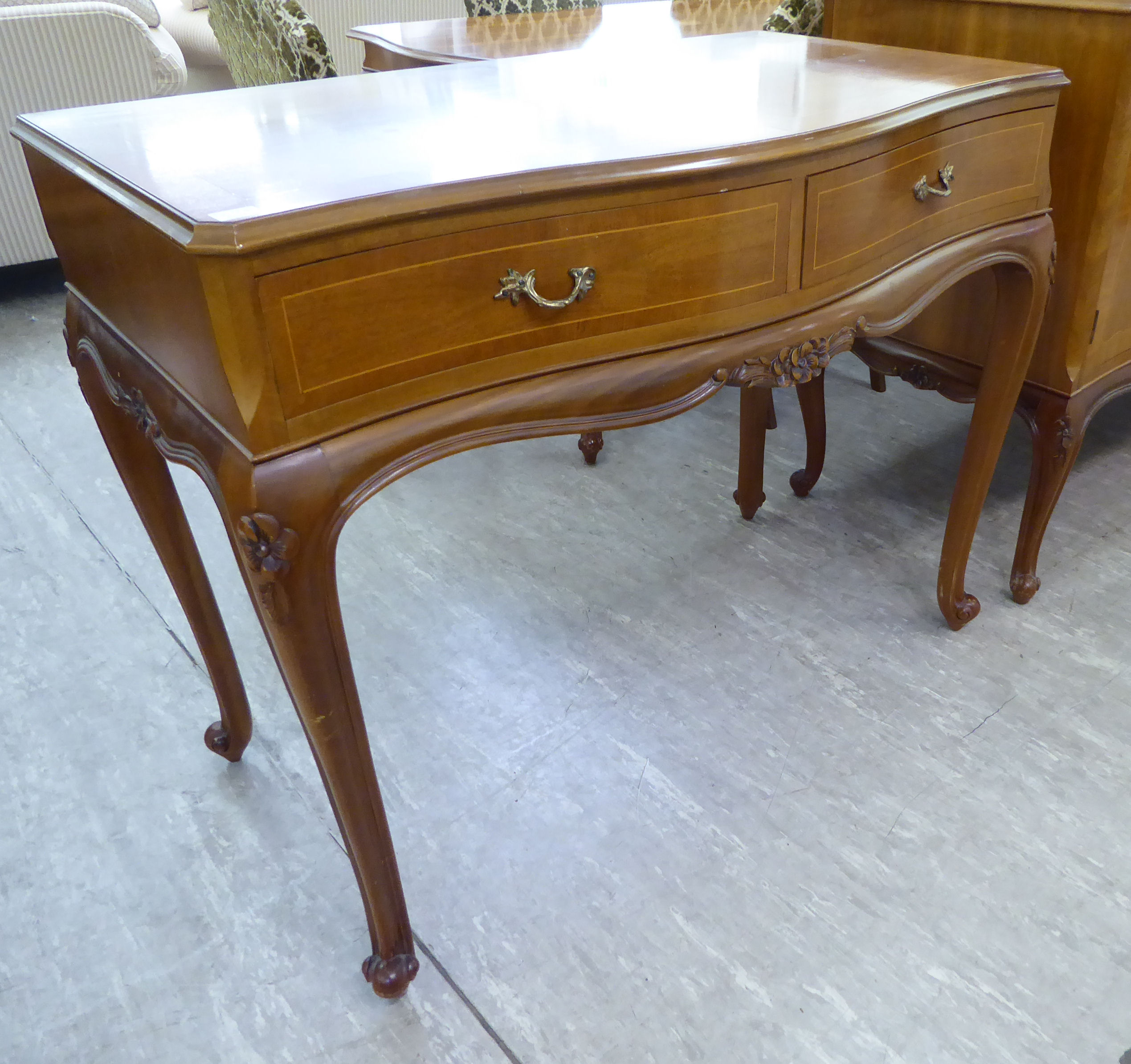 A mid 20thC walnut veneered dining suite, viz. - Image 3 of 5