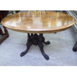 A late Victorian marquetry inlaid walnut breakfast table,