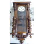 A late Victorian mahogany and walnut cased regulator;