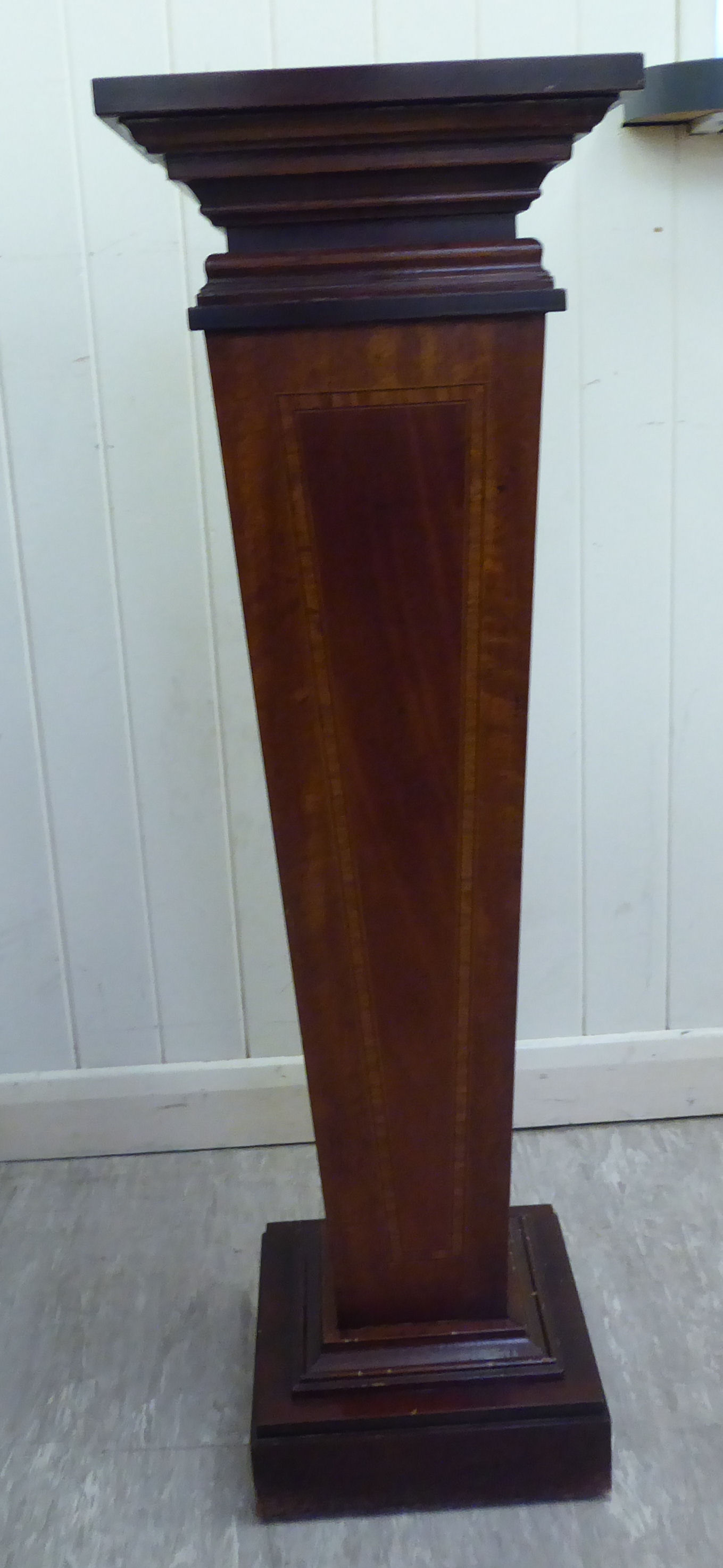 A modern Edwardian style crossbanded and ebony inlaid mahogany pedestal of tapered form,