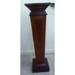 A modern Edwardian style crossbanded and ebony inlaid mahogany pedestal of tapered form,