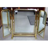 A modern lacquered brass framed triptych dressing table mirror 21''h 34''w open SR