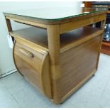 A Utility Incorporall mahogany finished combination coffee table/cabinet,