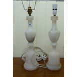 A pair of alabaster table lamps,