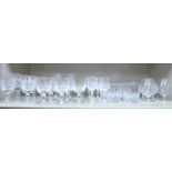 Slice decorated crystal stemmed drinking glasses comprising sherries,
