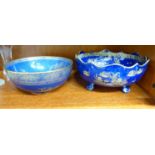 A Carlton Ware sponged blue glazed china bowl with a wavy edge, elevated on stubby feet,