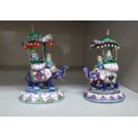 A pair of 20thC Indian multi-coloured enamel on white metal models,