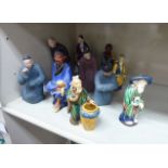 Ten dissimilar 20thC Chinese ceramic figures, in various costumes 5''-7.