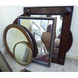 Five mirrors: to include a 1920s stained oak framed example 16'' x 21'' RSB