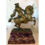 H Muller - a late 19thC cast gilt bronze figure, a man holding a horn, riding a rearing horse,