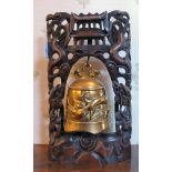 An early 20thC Chinese carved rosewood framed brass table bell 15''h 9''w (From the Ian