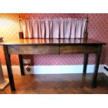 A Regency mahogany serving table, the top having a moulded edge, raised on chamfered,