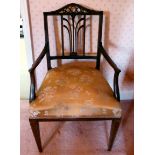 An Edwardian satinwood inlaid mahogany framed bedroom chair with a pierced splat, raised on square,