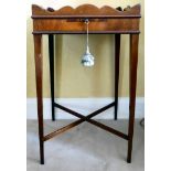 A mid 20thC Regency design mahogany lamp table with a galleried top, over a candle slide,
