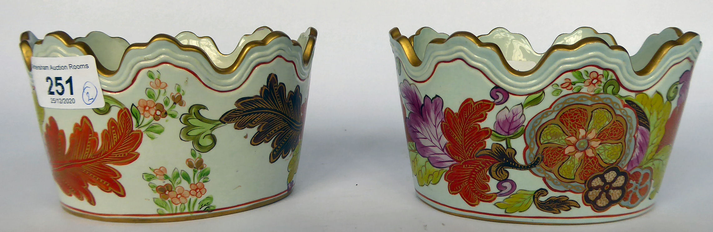 A pair of early 20thC Italian pottery Monteith design oval bowls,