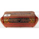 A late 19thC red and black lacquered two part box of cylindrical form 4''h 9''w (From the