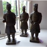 A set of three modern 'antique' finished composition Chinese figures of warriors 13''h