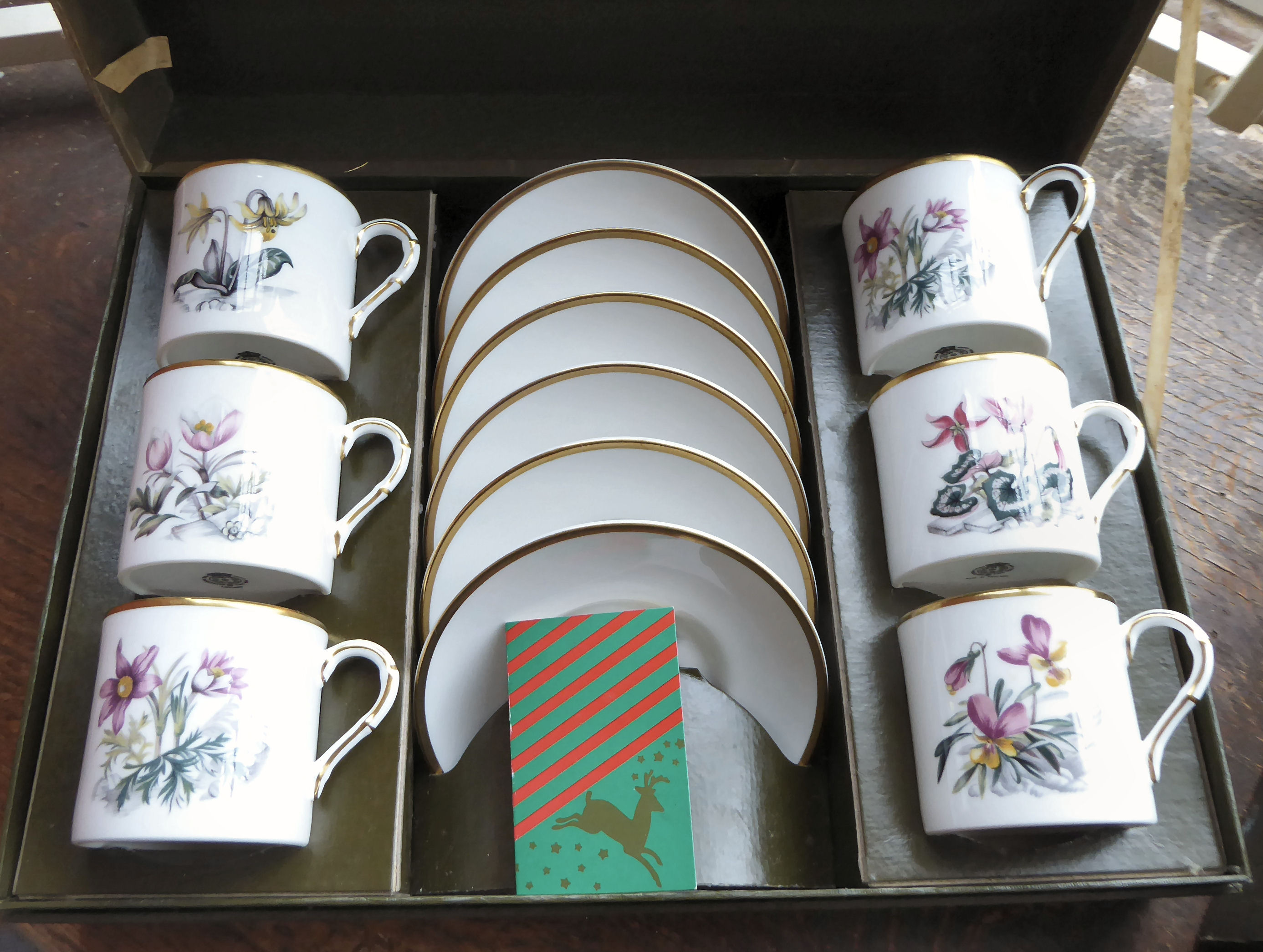 A set of twelve Royal Worcester china coffee cans and saucers, decorated with floral specimens, - Image 2 of 4