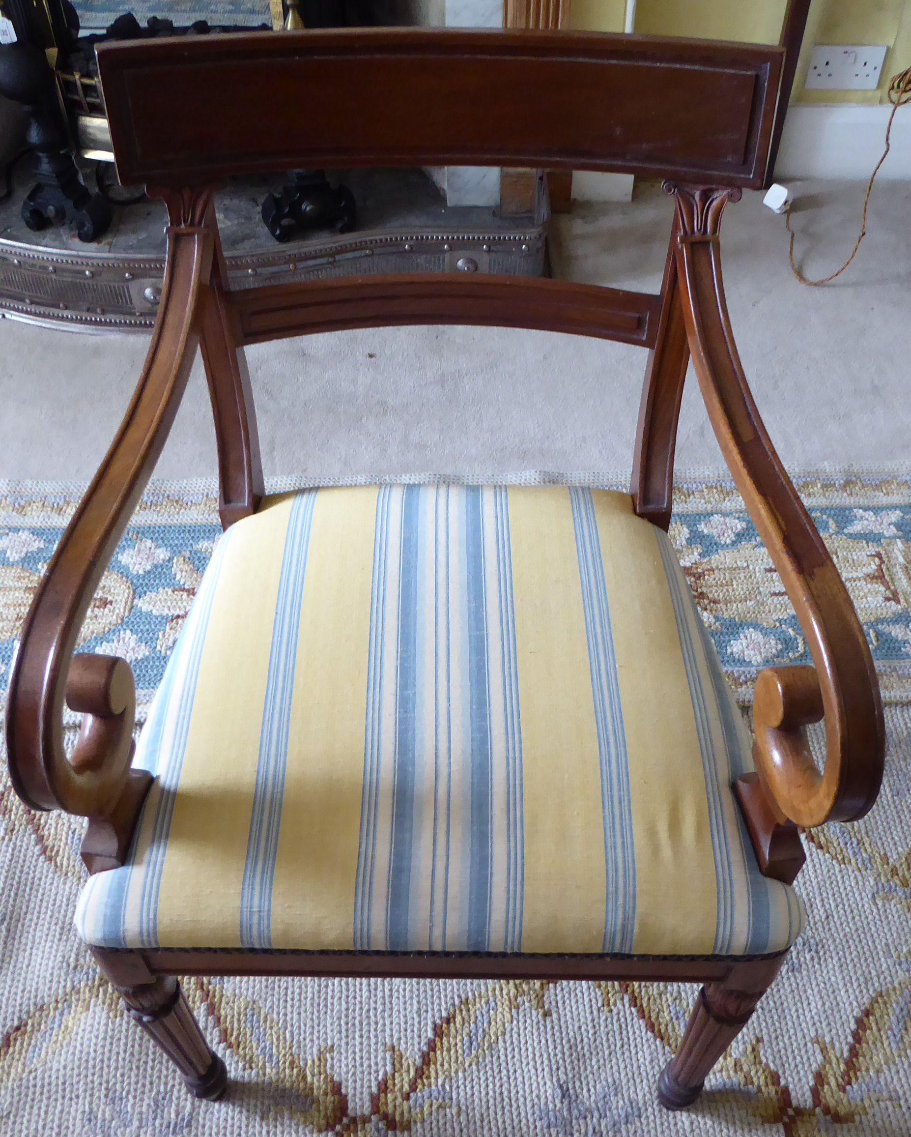 An early 20thC Regency design mahogany framed elbow chair with a stripe upholstered seat, - Image 3 of 3