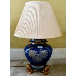 A modern Chinese inspired porcelain table lamps with Dog of Fo feet 14''h (From the Ian