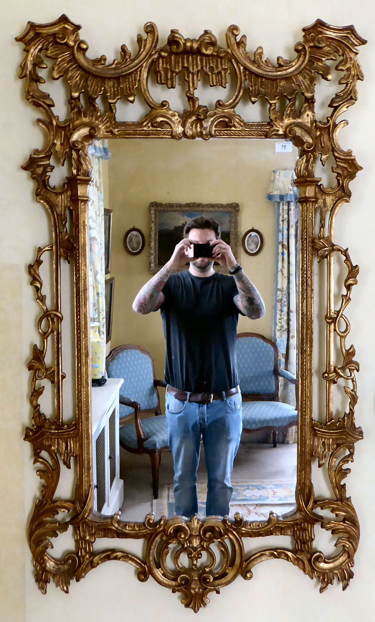 A mid 20thC Chippendale design gilt gesso framed mirror with ornately pierced ornament 55'' x 32''