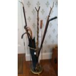 Various 20thC walking canes: to include a resin example, fashioned as a ram's head,