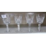 A set of four Waterford crystal Lismore pattern pedestal wines SR