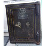 An early 20thC iron safe (with key) 17''h 14''w 12''deep F