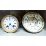 Five late 19th/early 20thC clock movements: to include an 8 day example,