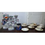 Victorian ceramics: to include a Staffordshire pottery three piece clock garniture group,